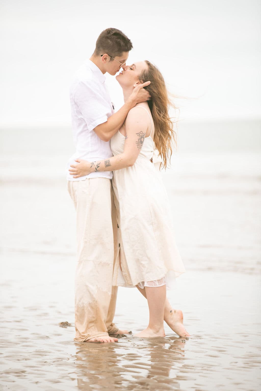 Beach couple portrait at sunset