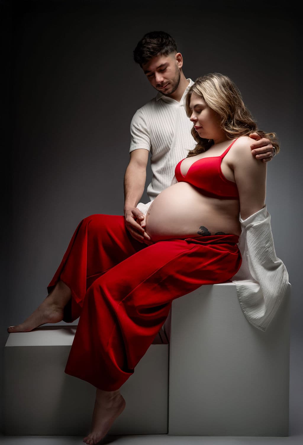 Studio maternity couple portrait