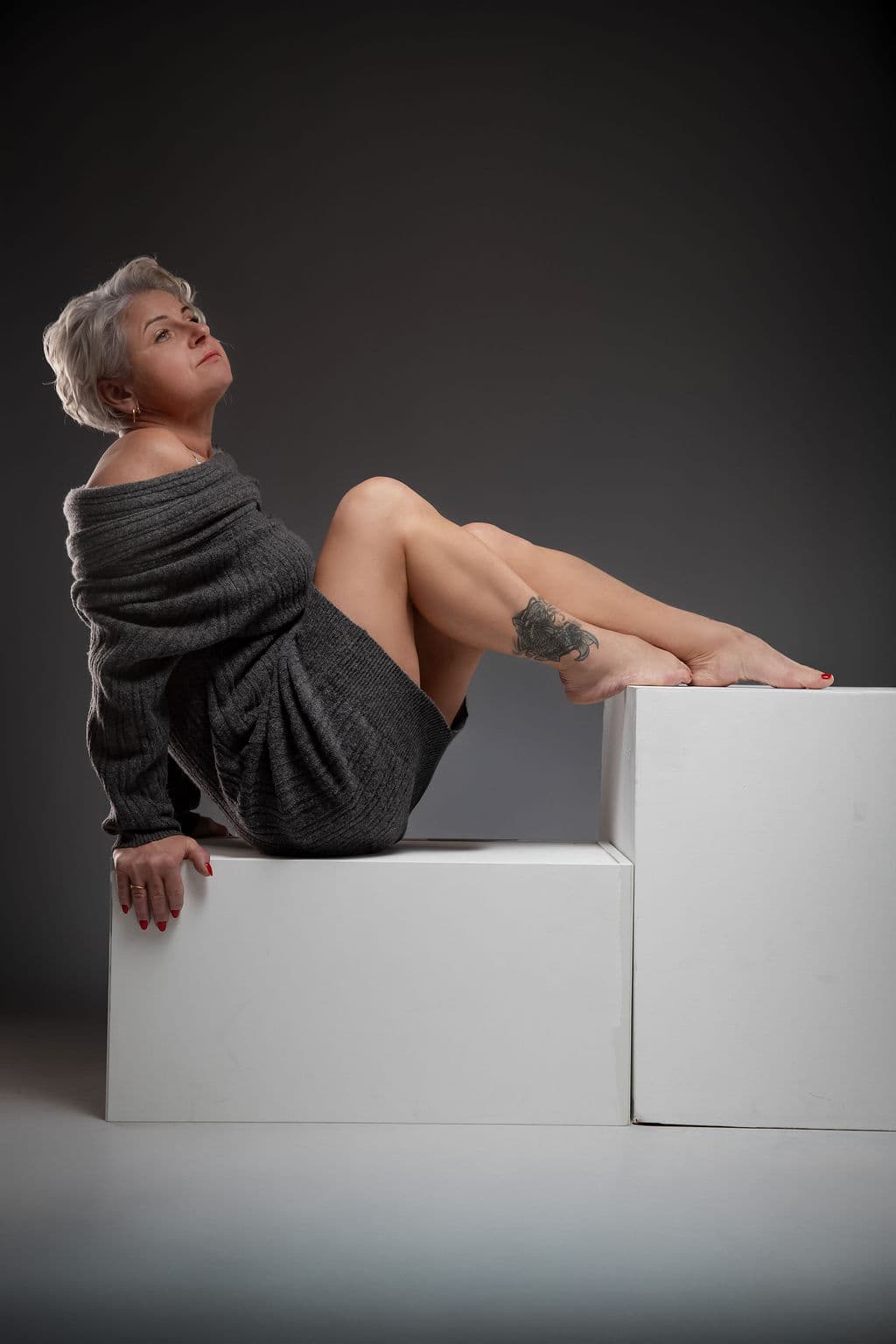 Creative studio pose on cubes