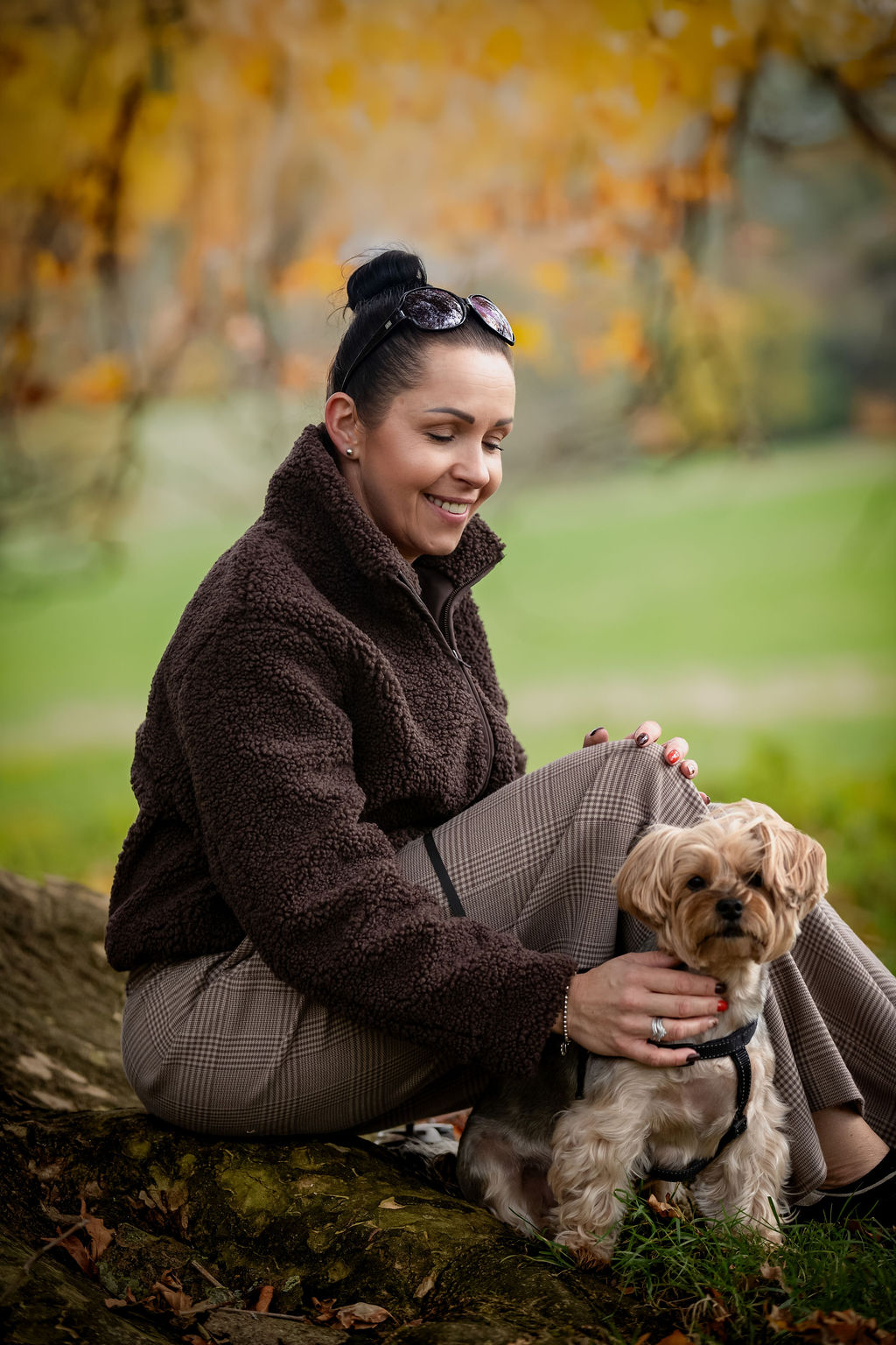 Portrait with dog in autumn setting