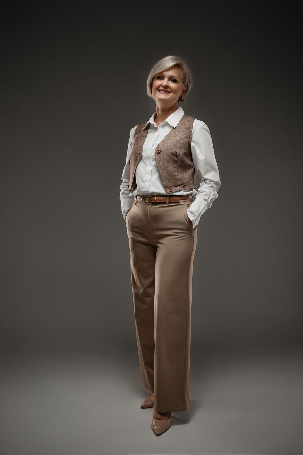Full-length studio portrait in waistcoat